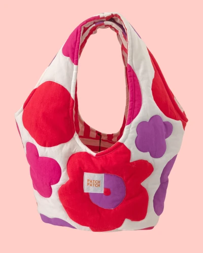 Pikowana torebka wiaderko w kwiaty